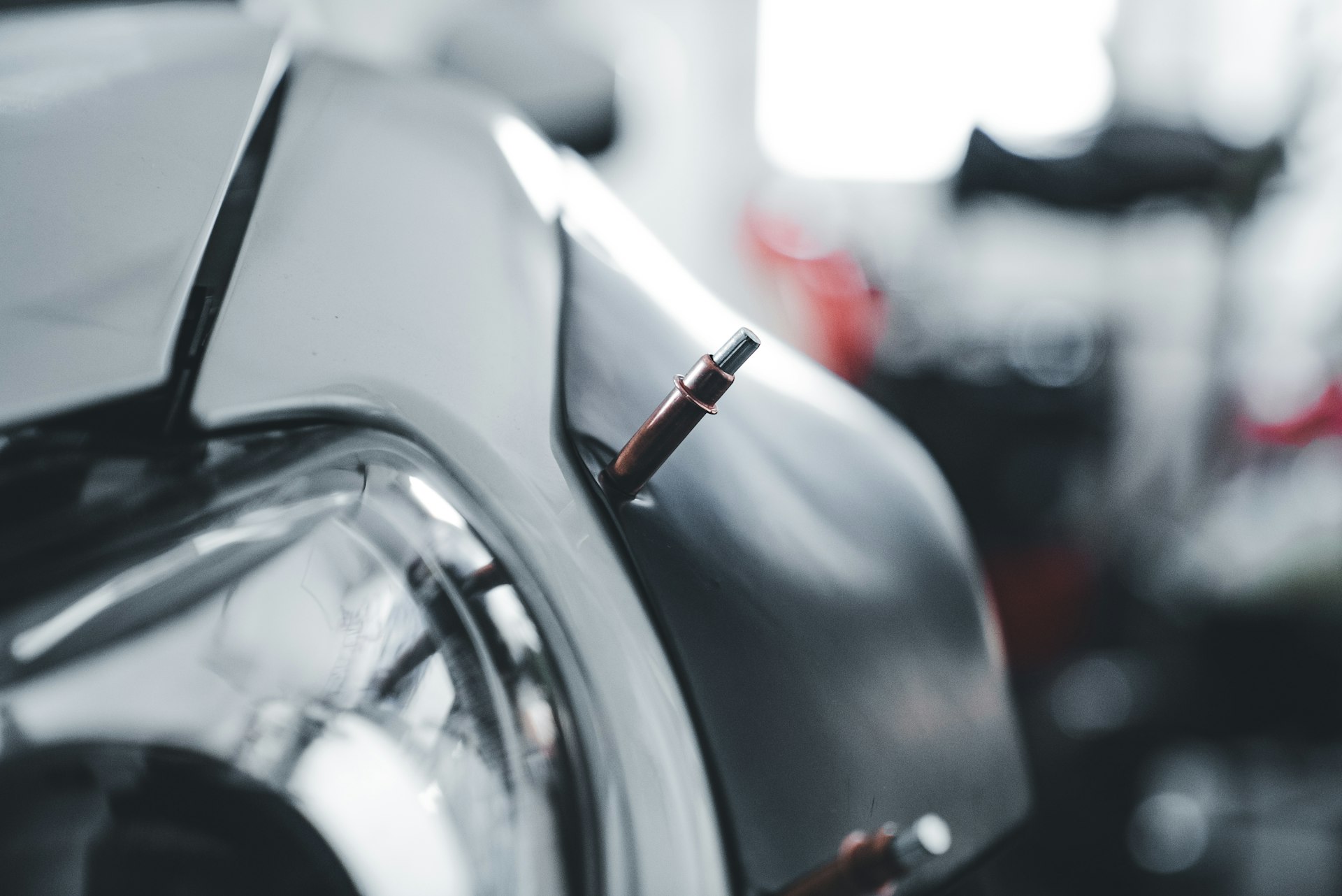Car body being spot welded during collision repair